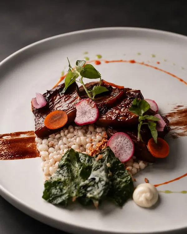 Adobo con cacao: glazed pork over garlic adlai with battered water spinach and a dot of aioli